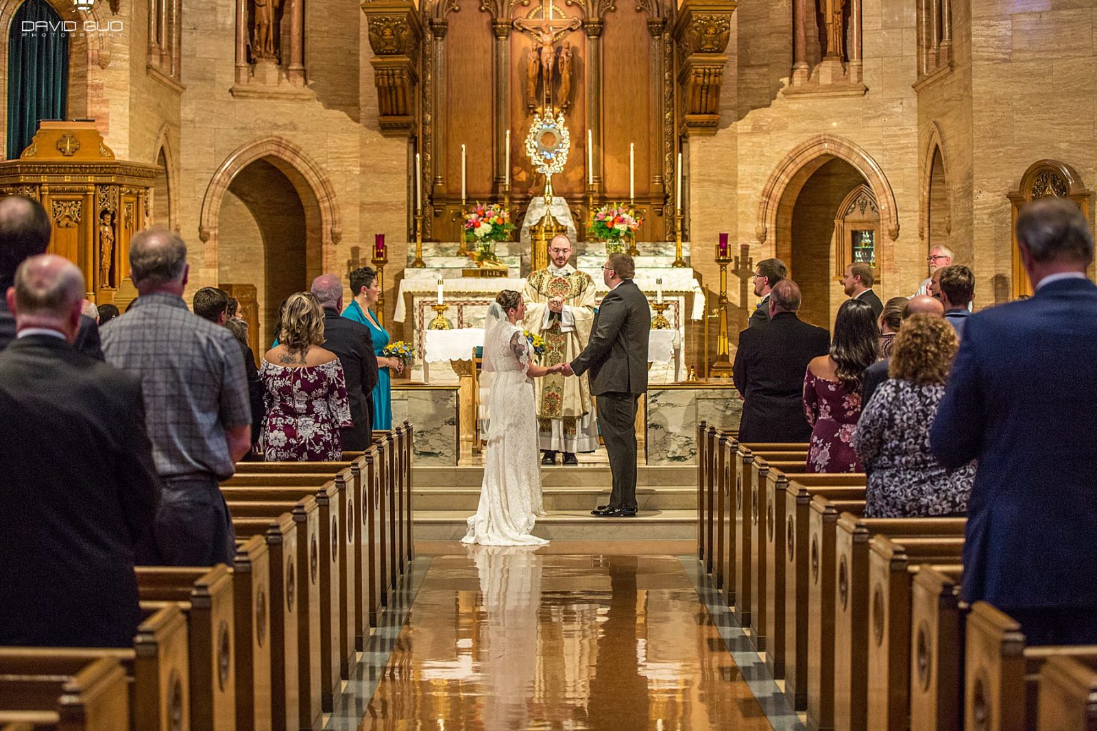 Holy Ghost Denver Wedding bride groom on the alter