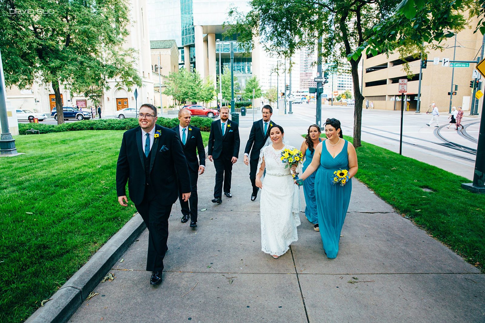 downtown denver wedding party walking
